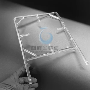 Clear Fused Quartz support frame with multiple angled bars and flat mounting points, held by a gloved hand