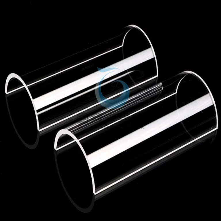 Two clear, half-cylindrical Fused Quartz components with polished edges, used as liners or shields