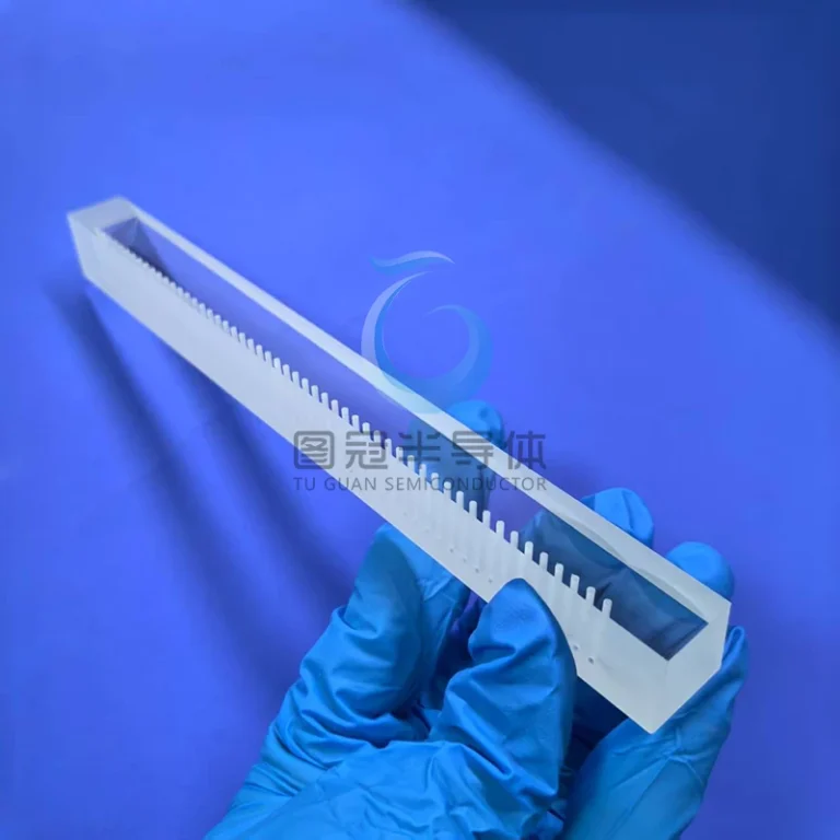 a long, clear Fused Quartz rod with a precise, etched serrated pattern along one edge.