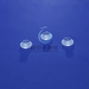 Three translucent sapphire glass steps or support rings with central holes and flared bases.