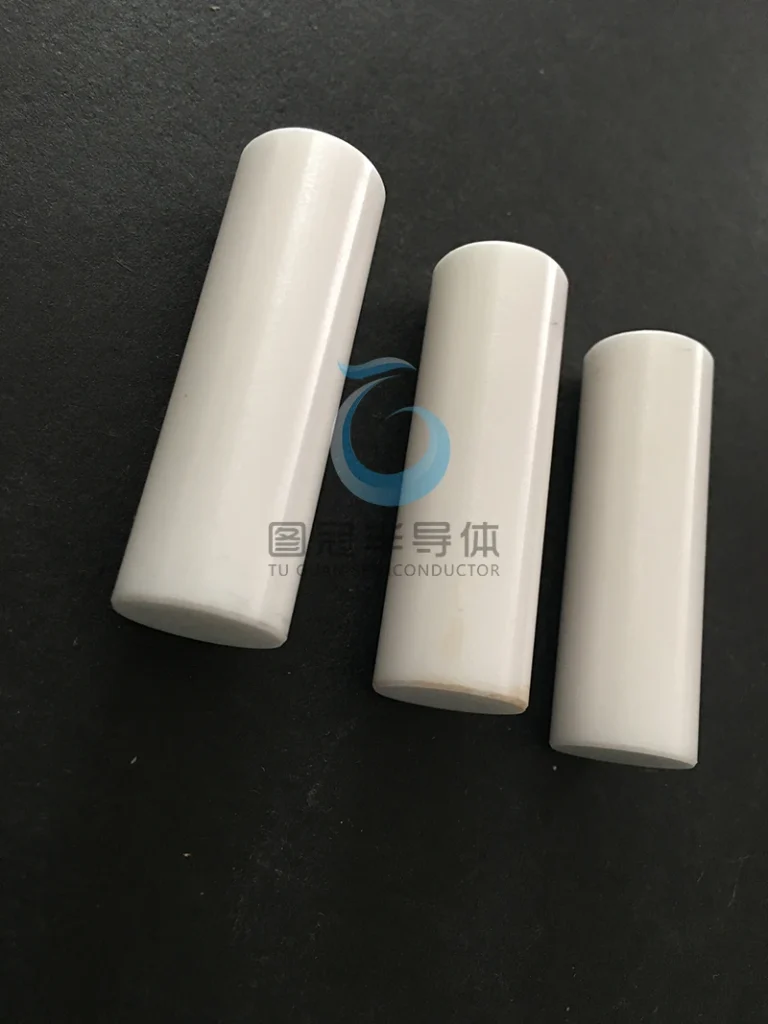 Three different sizes of cylindrical precision ceramic rods.