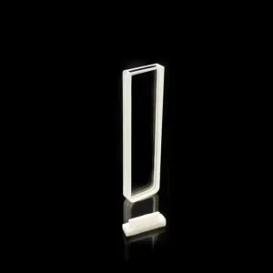 Tall, clear Fused Quartz rectangular cuvette standing upright with a white stopper.