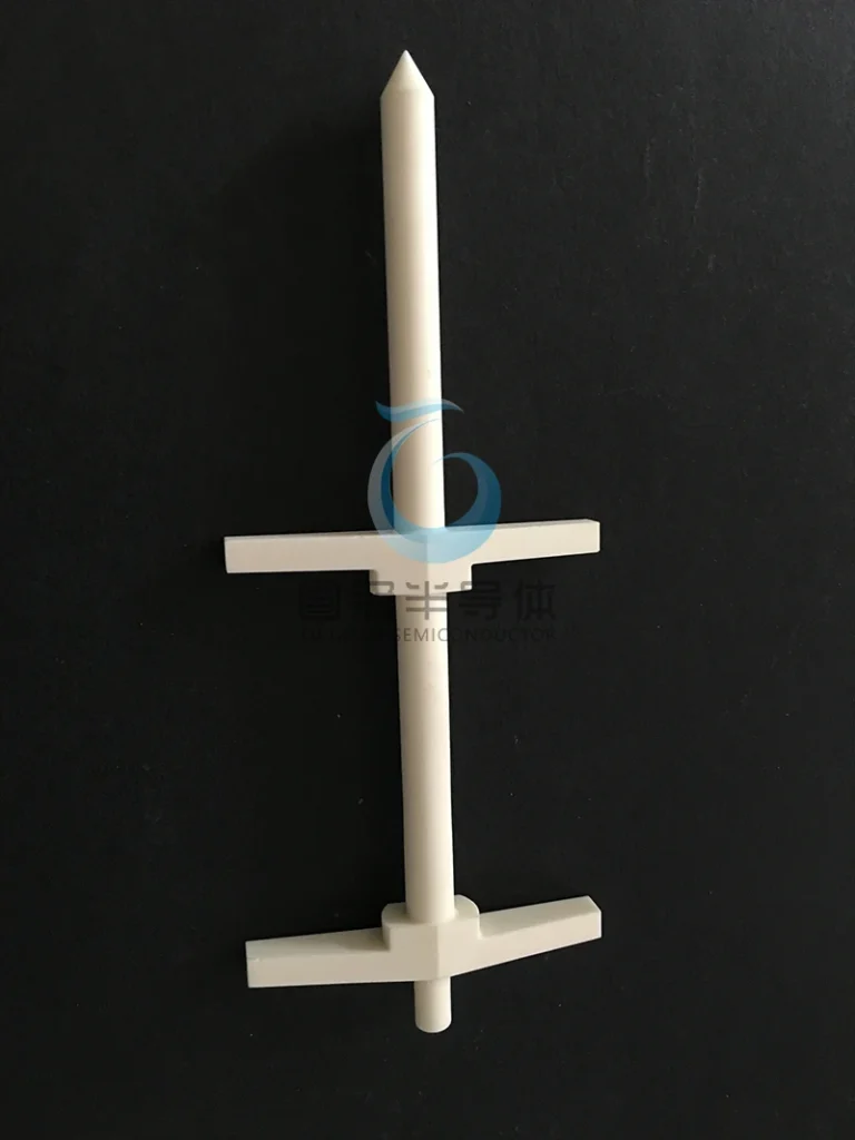 Complex engineered ceramic rod with pointed tip and horizontal support features.