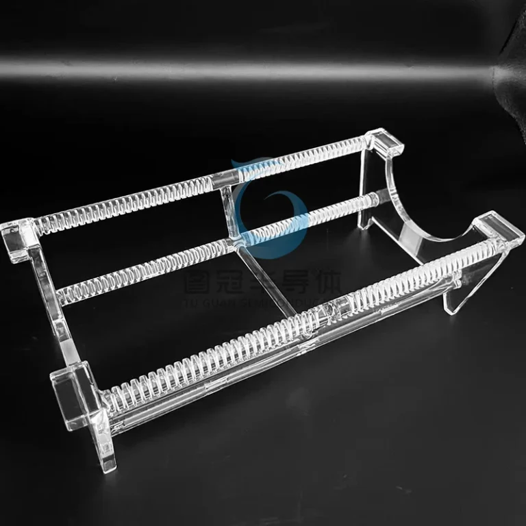 Clear fused quartz wafer boat with multiple slots for semiconductor wafers.