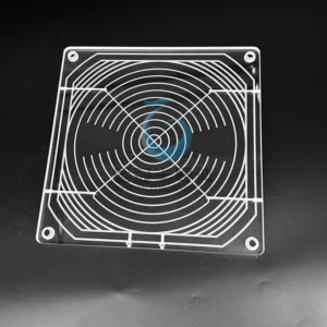 Top-down view of a clear, square Fused Quartz plate with an intricate concentric circular and radial etched pattern, resembling a fan guard