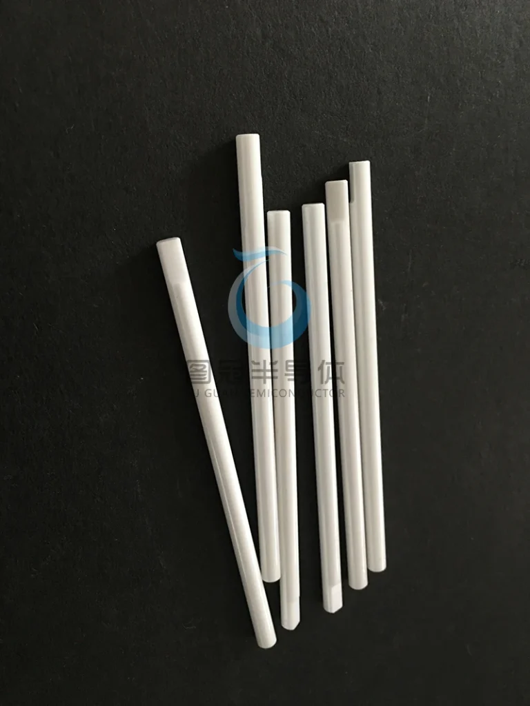 Group of assorted slim, straight precision ceramic rods.
