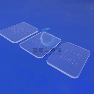 Three clear, rectangular Fused Quartz sieve plates, each with a grid pattern of small, precisely spaced circular protrusions.