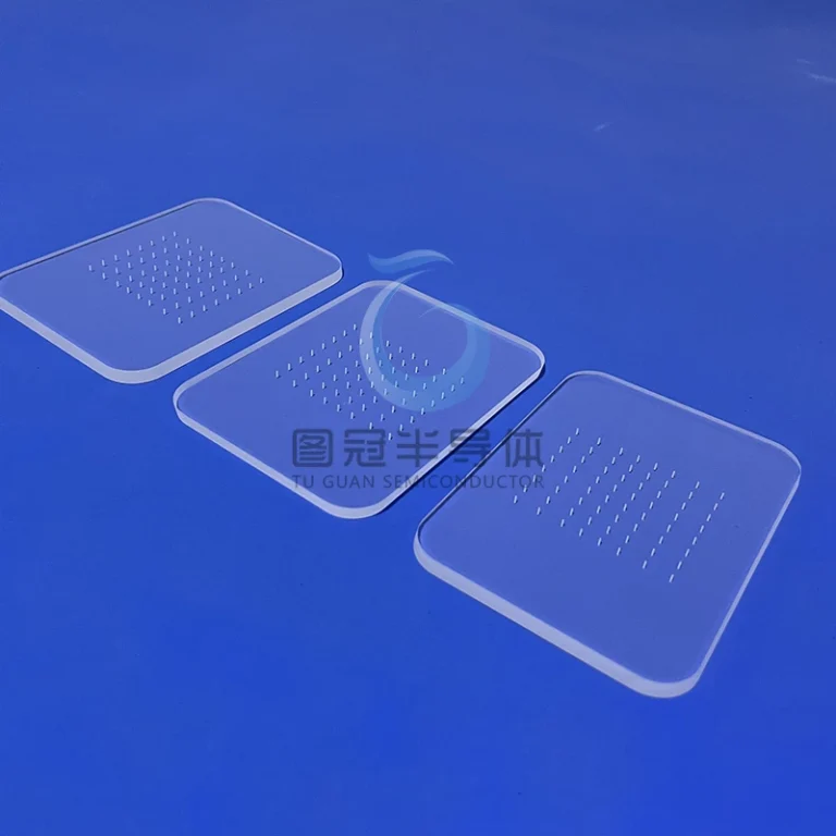 Three clear, rectangular Fused Quartz sieve plates, each with a grid pattern of small, precisely spaced circular protrusions.