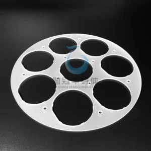 Clear circular Fused Quartz plate with multiple large cutouts and small perimeter holes.