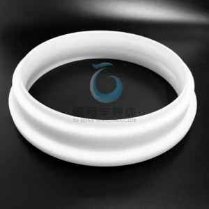 Opaque Fused Quartz ring with a prominent central groove, resting on a dark surface